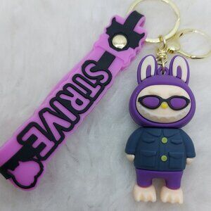 2/$25 Labubu purple with navy outfit keychain with strap "Strive"